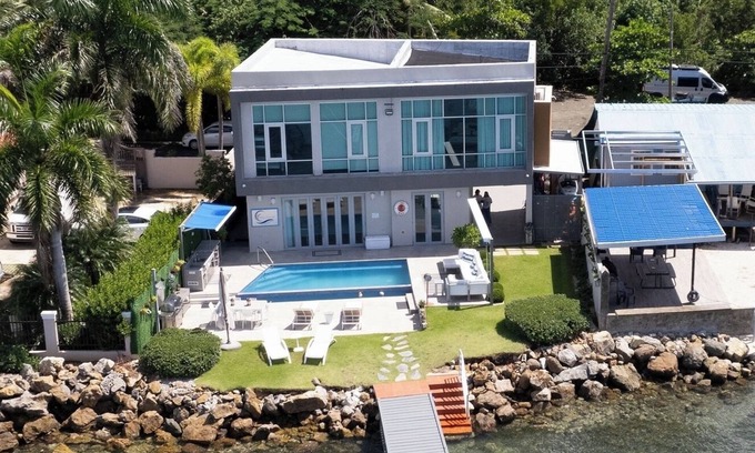 Guanajibo Villa | Luxury Ocean Front Villa with Heated Infinity Pool, Private Pier and Kayaks