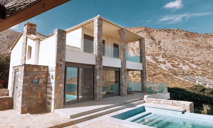 Elounda Villa | luxury villa in front of a historic famous island