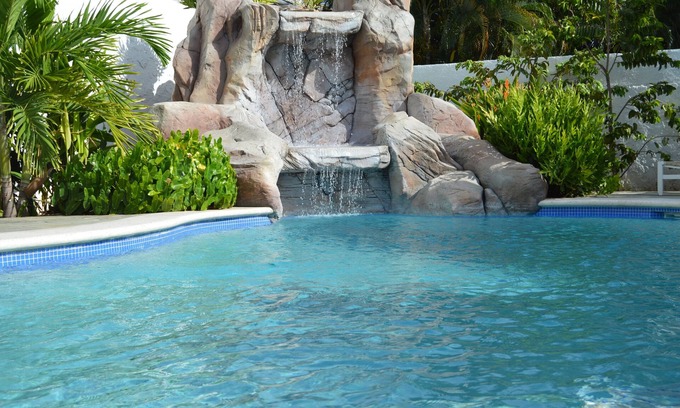 Willemstad Villa | Luxury Villa with private pool and tropical garden near Mambo & Cabana beach