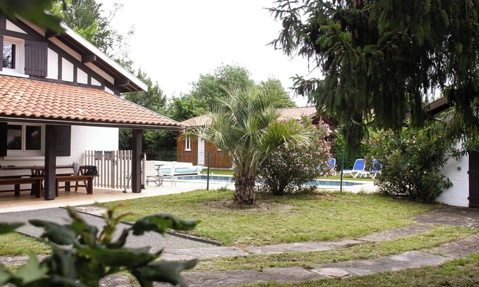 Sainte-Eulalie-en-Born Villa | Magnificent, recently renovated villa with private pool and wooded grounds.