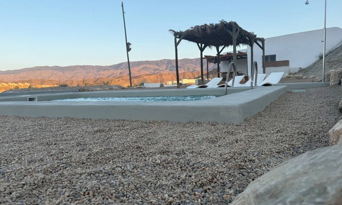 Tabernas Ski Chalet | MAMANGUEÑA CORTIJO POOL AND CAVE. DESERT TAVERNS. RELAX. AVENTURA.CINE