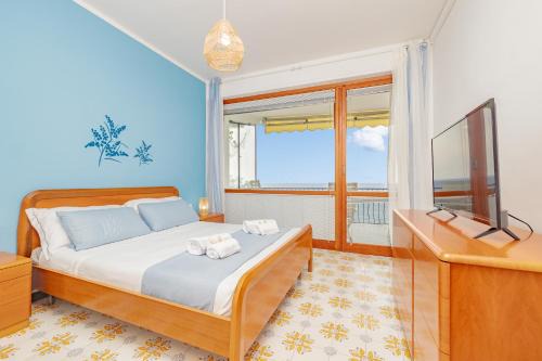 Capo Mimosa-Rollo Apartment | Mimosa Blu con vista mare terrazza - Wi Fi - AC - Parcheggio