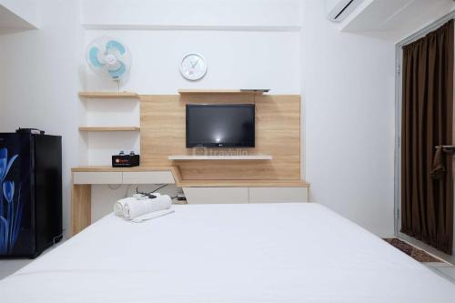 Gunung Putri Apartment | Modern and Homey Studio at Gunung Putri Apartment By Travelio