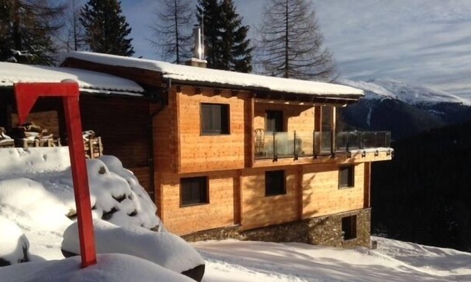 Turracher Hohe House | Modern comfortable spacious mountain chalet with wellness area and tiled stove