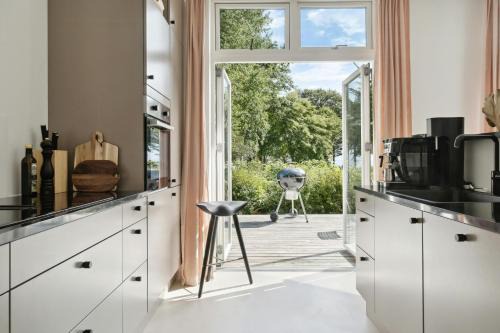 Nysted House | Modern Family Home By The Sea With Activities