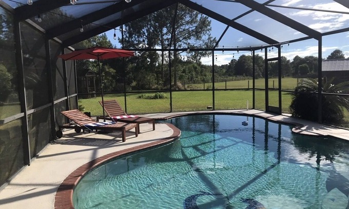 Zephyrhills Other | Modern farmhouse with heated pool and fireplace ~3.6 miles from Epperson Lagoon!