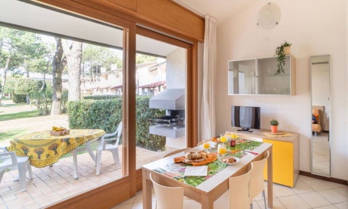 Bibione Lido dei Pini Apartment | Modern home with garden and pool