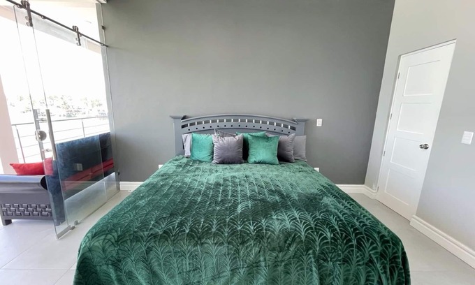 Tequesquitengo House | Modern Lakeside Retreat: Beach Access, All-White Tile, & Stylish Décor