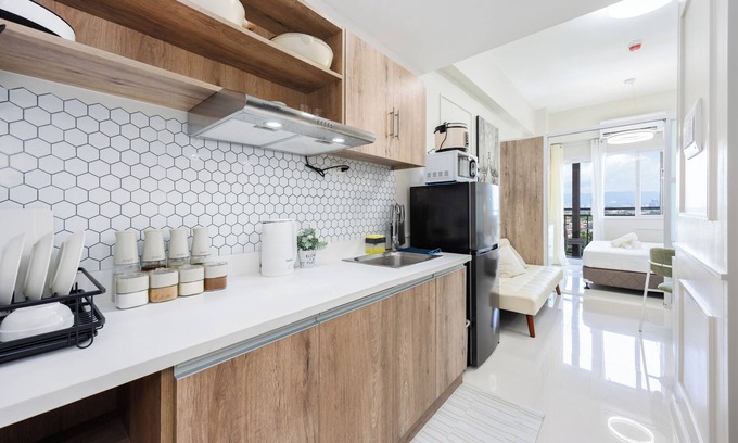 Lapu-Lapu Condo | Modern Nordic Studio with Balcony and Pool in Primeworld District Near Airport