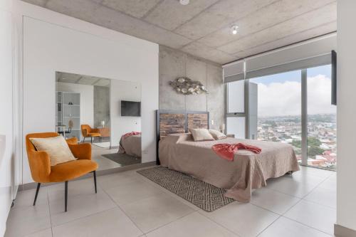 Curridabat Apartment | Modern Oasis iFreses, 18th floor! AC, TV and Pool