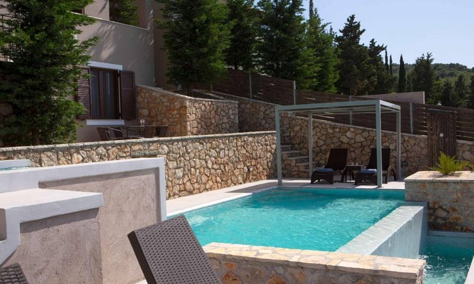 Tsoukaladhes Villa | Modern villa with pool and sea views.