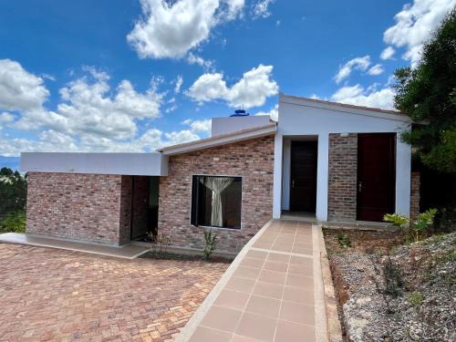 Tibasosa Apartment | Monoambiente con Vista - La Violeta