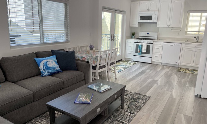 The Strand House | New ocean front duplex, walk to dining, shops & entertainment.