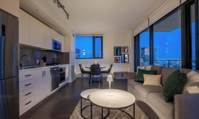 Connaught Condo | NEW! Poolside Bliss: 22FL DT Tower View FREE Banff Pass, Gym, Wine!