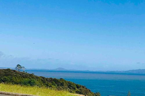 Cable Bay House | New with a View & Only 500 metres to the Beach!