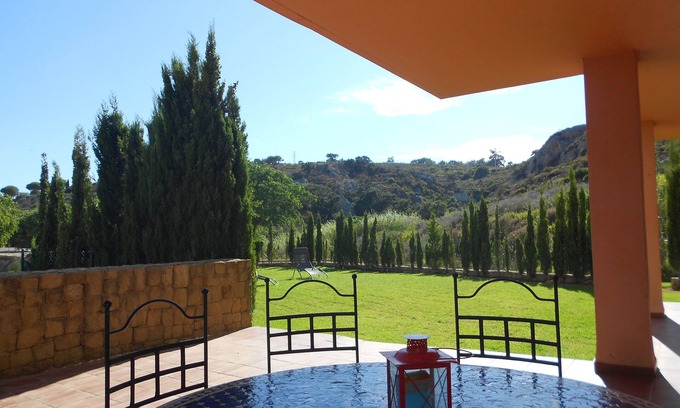 Manilva Apartment | Next to Sotogrande, Great apartment with private garden and sea views WIFI