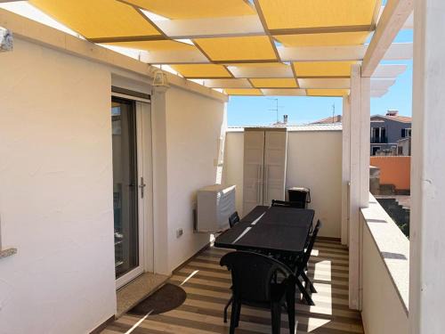Sant'Antioco Apartment | Nuovissimo appartamento all'ultimo piano con terrazza in centro a Sant'Antioco C170.