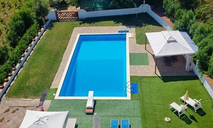 Nulvi Apartment | Oasis of Relaxation: Apartment with Private Pool Surrounded by Nature