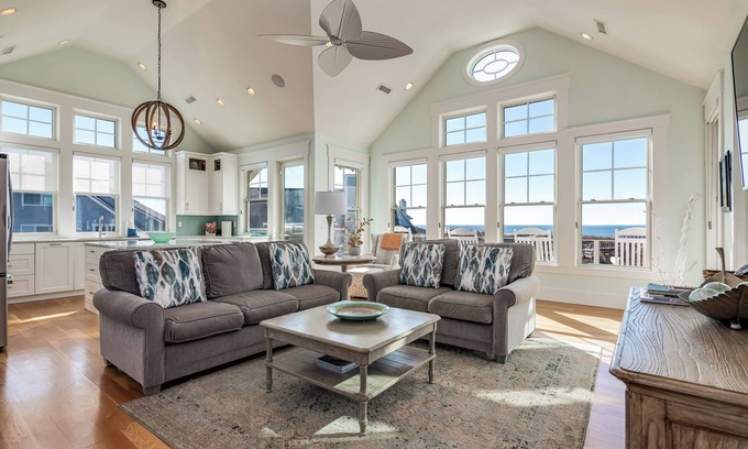 South Beach House | Ocean front 5 bedroom reverse floor plan home! Access to both clubs and 2 new golf carts