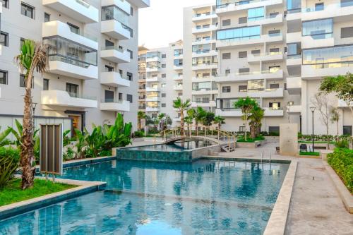 Ain Harrouda Apartment | Ocean Park Sunset Escape beach front with swimming pool