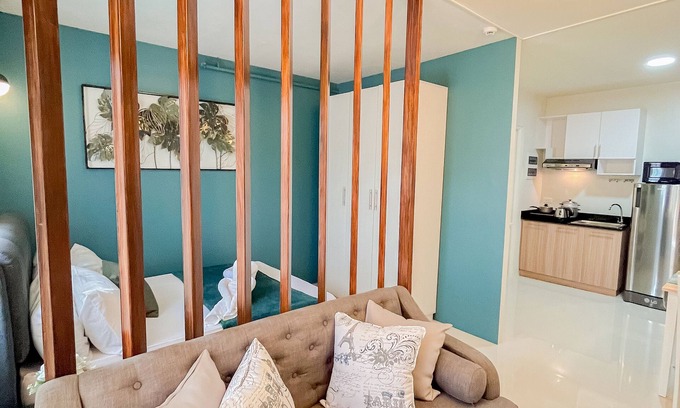 Puerto Princesa City Centre Apartment | Ocean Studio1 Bedroom, Private Balcony, Inviting Pool, and Gym