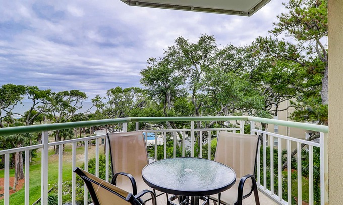 Palmetto Dunes Condo | Oceanfront getaway with lagoon views, shared pool & hot tub – walk to beach