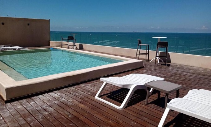 Chicxulub Puerto Apartment | OLEA Beach Condos en Chicxulub Puerto
