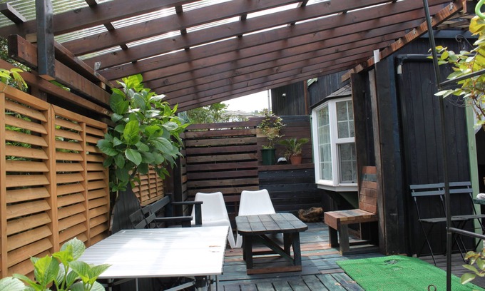 Futo Cottage | One (2) twin cottages with seasonal garden views. Wild Strawberry & Hollyhock.