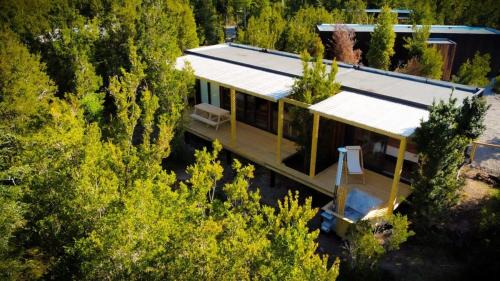 Lenca House | OUTSCAPE l Cabaña Familiar En Lago Chapo con Hot Tub