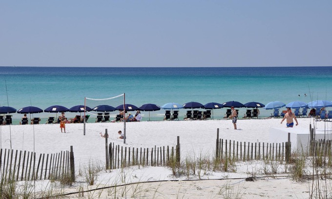 Gulf Pines Condo | Paradise Found: Experience Beachfront Accommodations ~ Resorts Largest Pool Deck