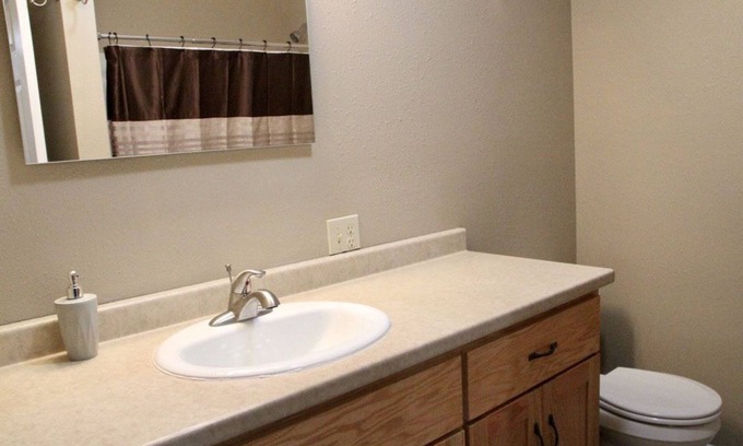 Lake City Apartment | Peaceful and one block from city square!