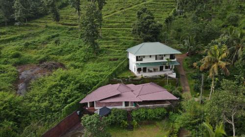 Punalur Hotel | Pepper and Clove Enclave