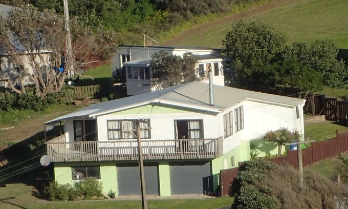 Baylys Beach House | Perfectly appointed property by the Baylys Beach adjacent to a reserve