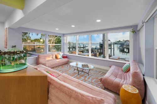 Ozona House | Pink Pony Villa - Waterfront Escape with Pool & Themed Rooms