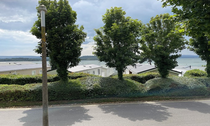 Hamworthy House | Poppy, dog-friendly caravan with panoramic sea views on Rockley Park Poole wi-fi