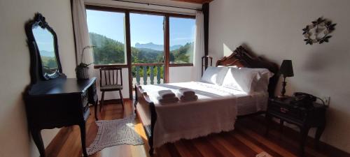 Castelo House | Pousada na Cervejaria Altezza - vista para Pedra Azul