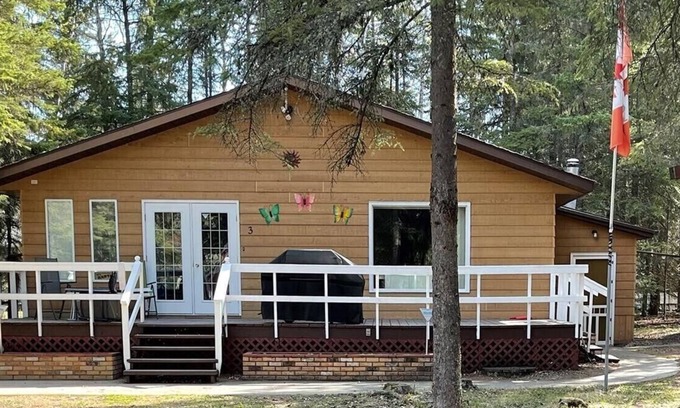Candle Lake House | Privacy galore! Beautiful lake home nestled in the forest, near all amenities:-)