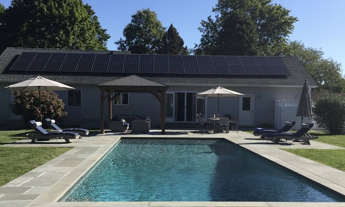 Silver Beach House | Private heated pool and spacious yard. 5 minute walk to the beach.