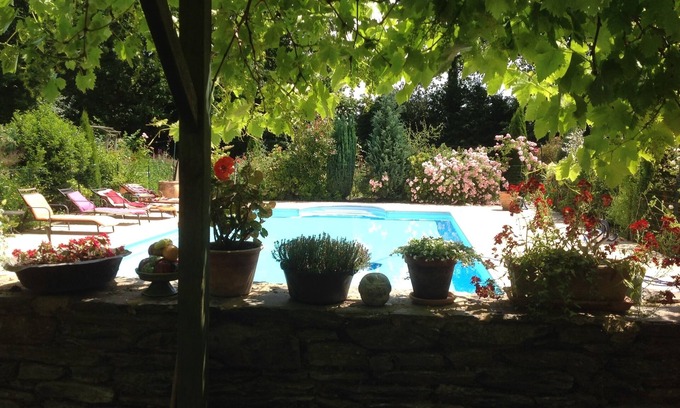 Ploermel House | Private heated pool, disabled access on ground floor, Gardens, quiet, family