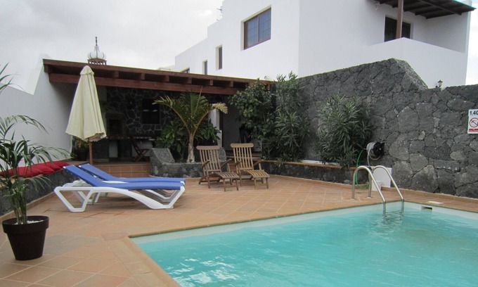 Tinajo Villa | private pool with huge games room inviting to relax and have fun