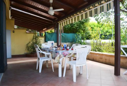 Torre dell'Orso House | Pt63 Casa a T dell Orso con veranda