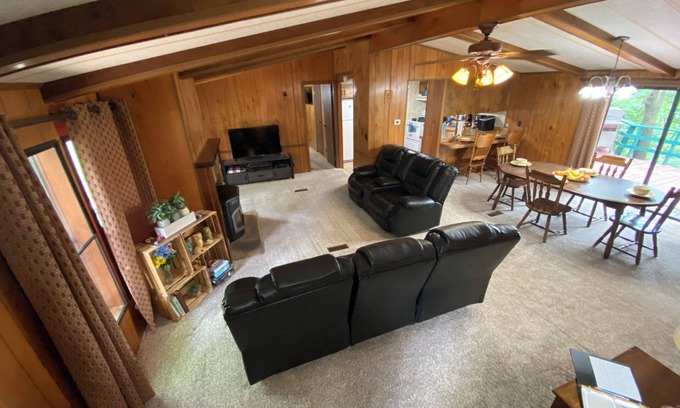 Flint Creek House | Quiet cabin in the woods w/access to pools, river, & lakes in gated community!