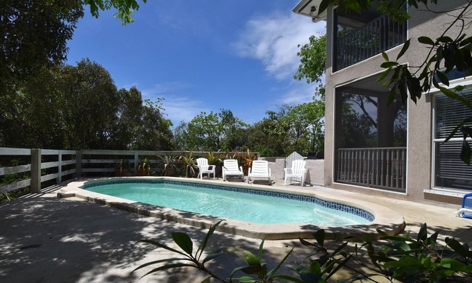 North Side House | Quiet, private nature retreat with pool and ocean views.