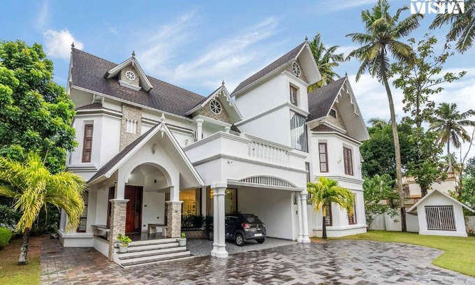 Thiruvananthapuram Villa | Raindrops by VEO - Part of StayVista