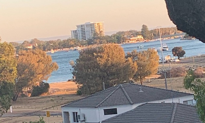 Halls Head Apartment | Recently renovated couples Retreat. Water views. Huge deck with tree in middle.