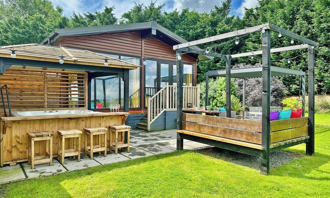 Raywell Ski Chalet | Recently upgraded with Gazebo over hot tub and side bar with stools.