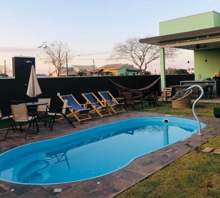 Aguas de Santa Barbara House | Refugio 4 suites com ar condicionado e piscina