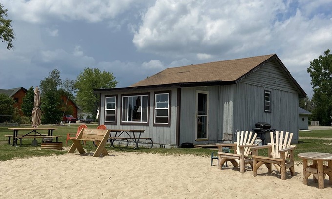 West Branch Cabin | Relax and Play: Lakeside Cabin with Beachfront, Kayaks and Fun-Filled Activities