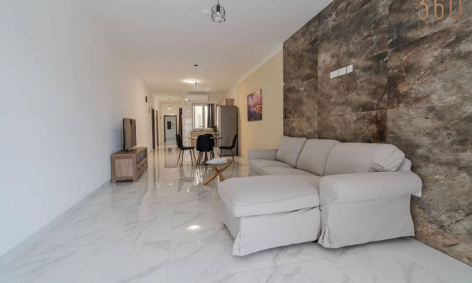 Tarxien Apartment | Relaxed 2BR Home with Backyard & Balconies,Tarxien