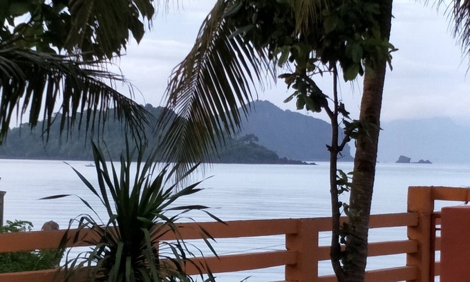 Calapan Condo | Relaxing beach side condo with mountain and island views.